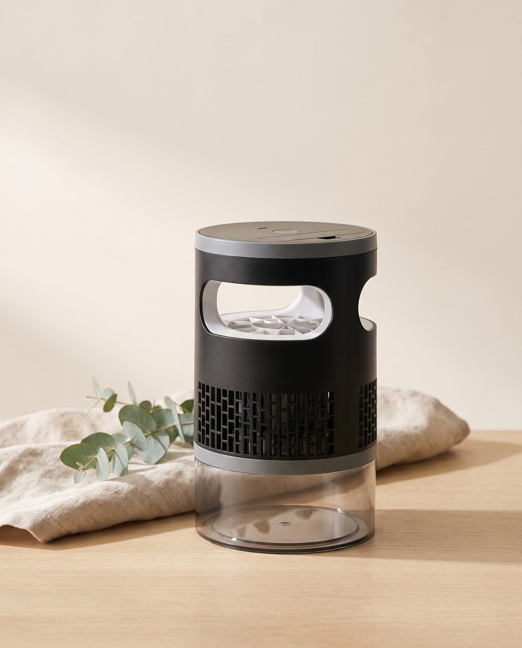 Cordless UV Mosquito Trap on a minimalist wood surface, silent and chemical-free