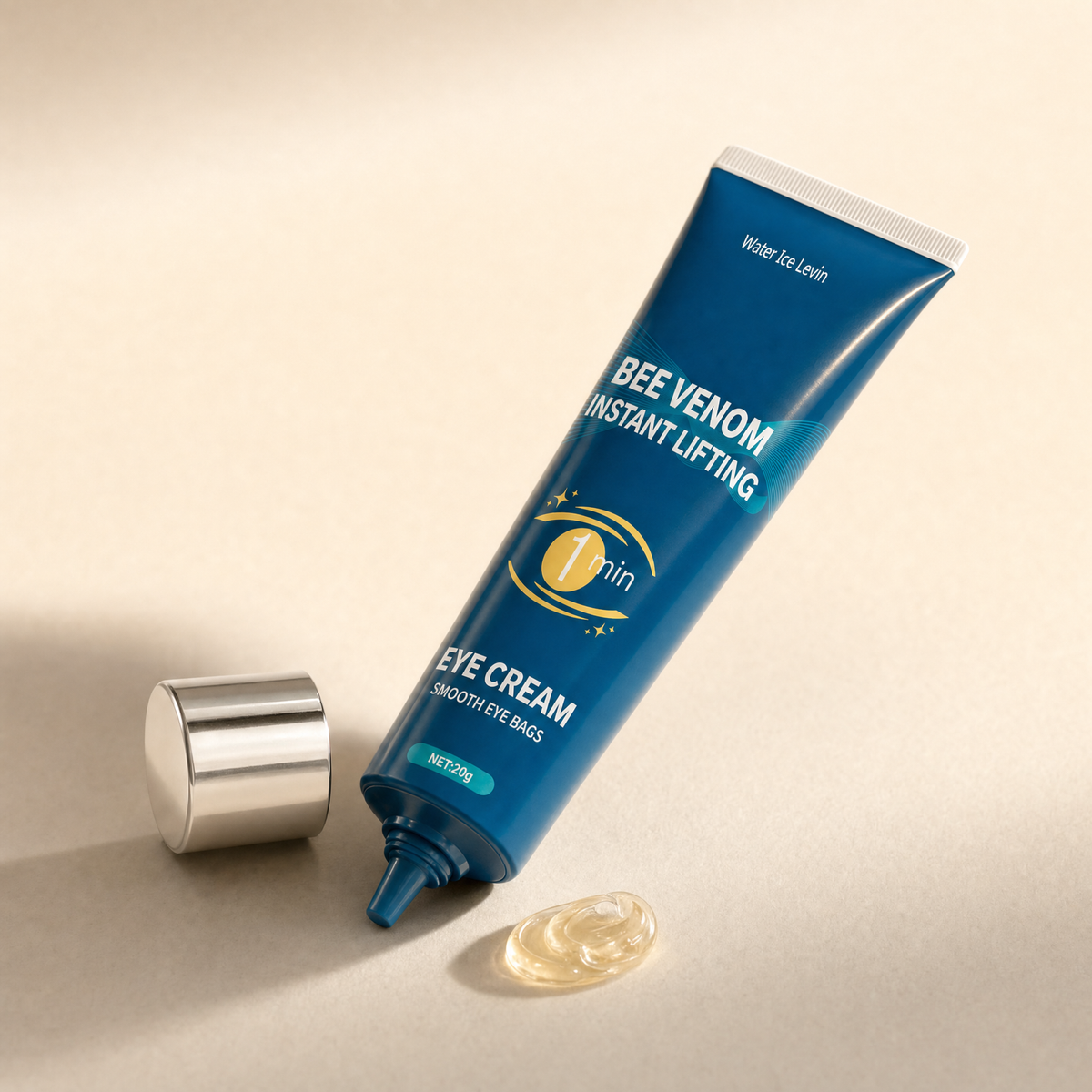 Clear eye gel texture beside the uncapped tube, nozzle and silver cap visible