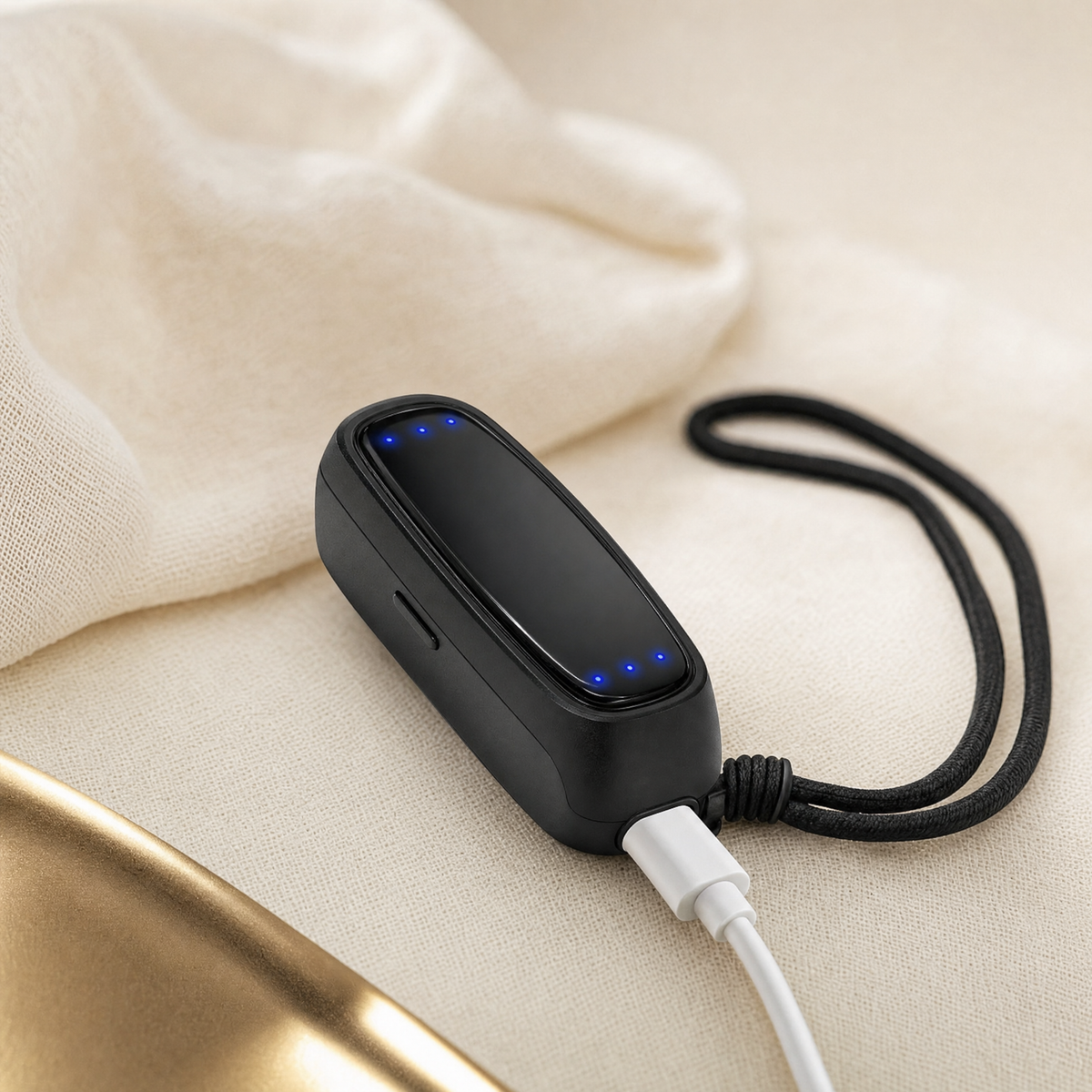 Close-up of the anti-snore device indicator lights and USB-C charging