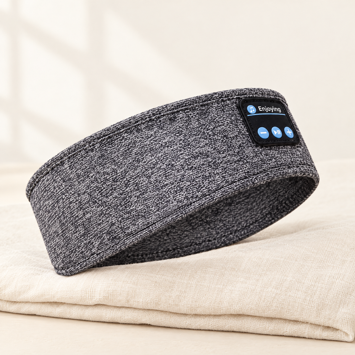 Gray sleep headphones headband with soft fabric band and 3-button control panel